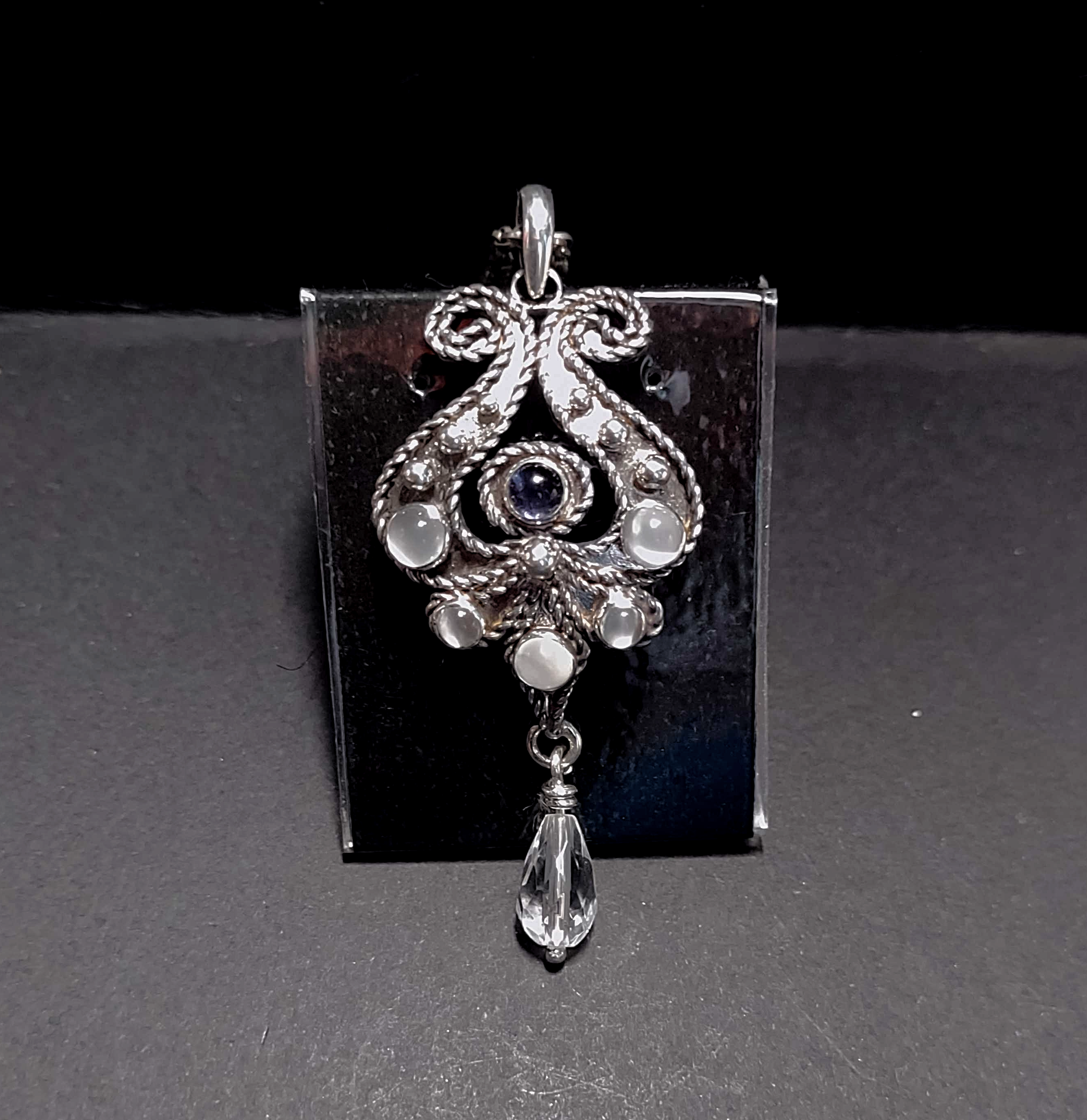 angel shaped silver pendant with 3x4mm and 2x3mm moonstone,a 3mm iolite and a crystal quartz bead