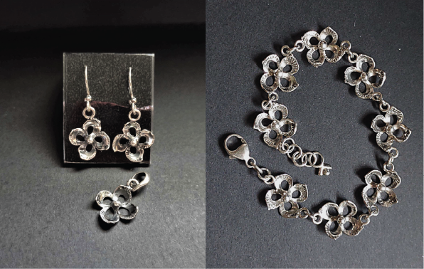 dogwood flowe earrings, pendant and bracelet made of sterling silver