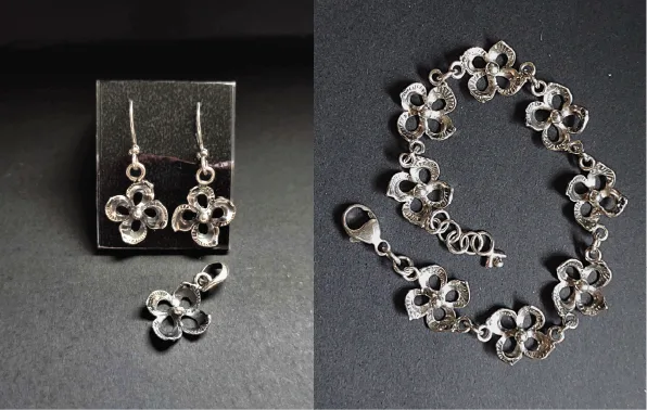dogwood flowe earrings, pendant and bracelet made of sterling silver